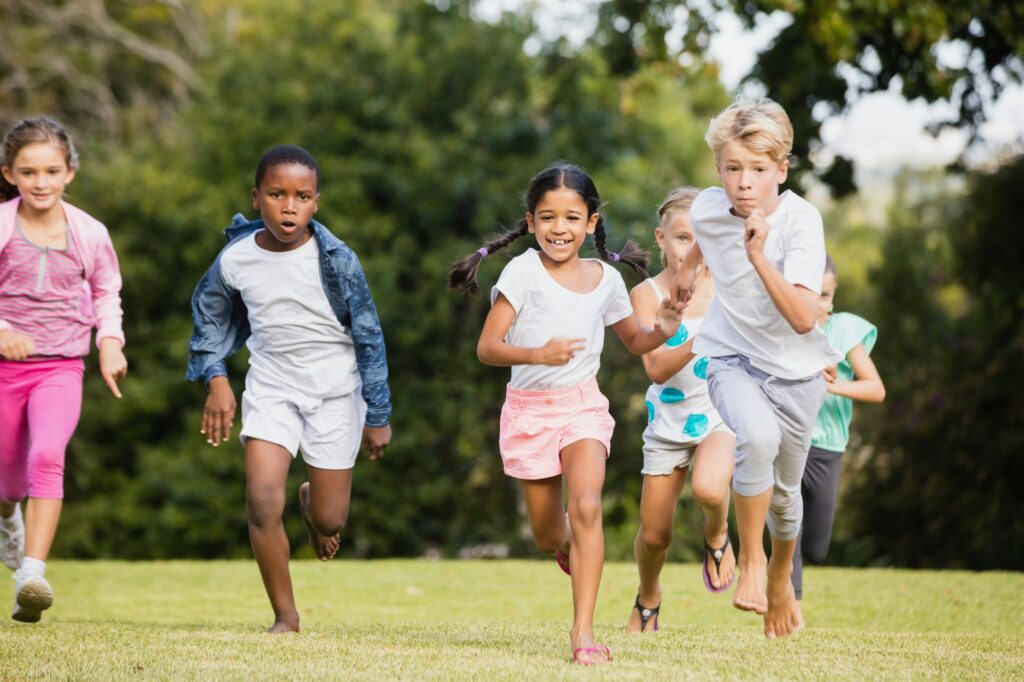 Kids playing together during a sunny day